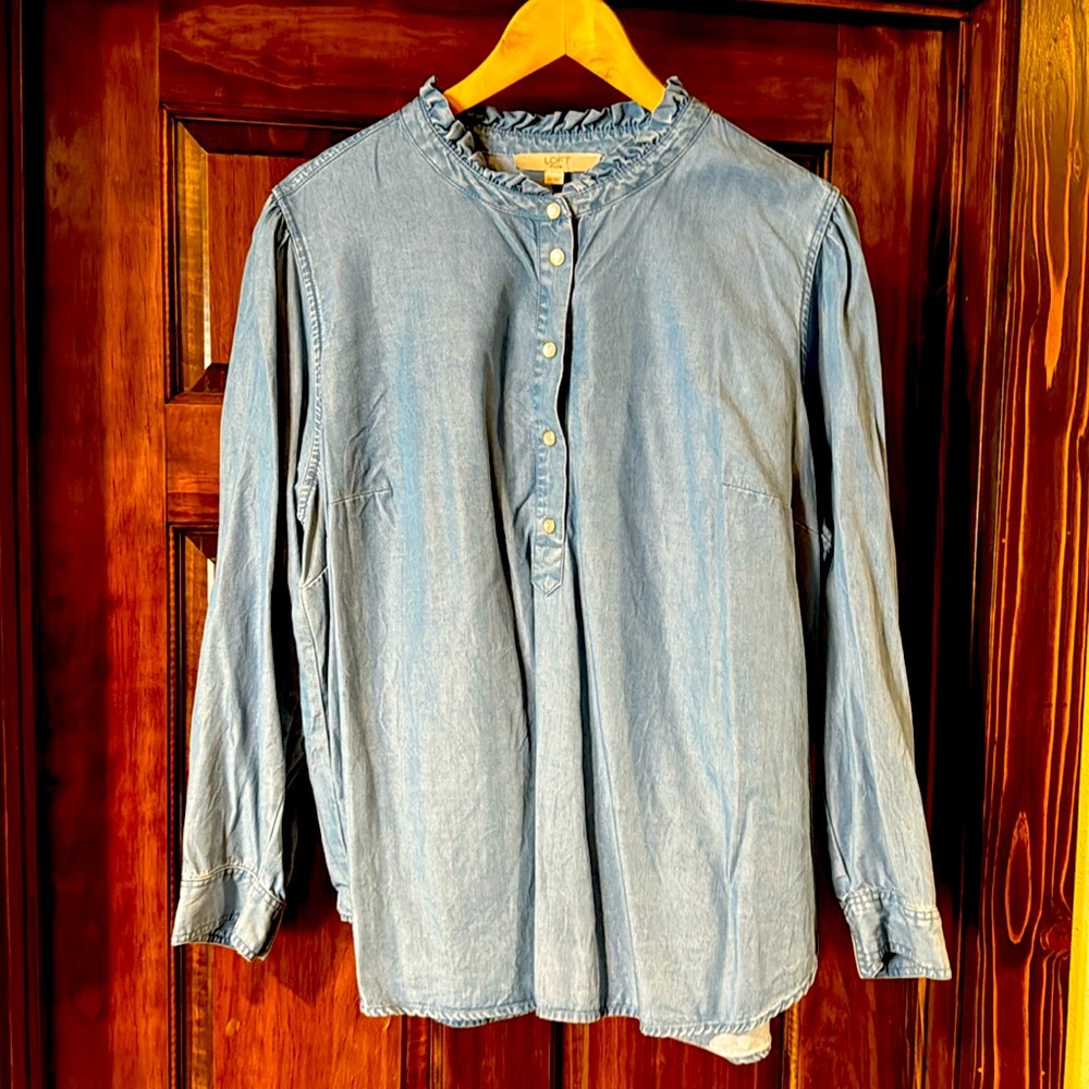 A little denim with a little collar ruffle.  You’ll love this long sleeve shirt